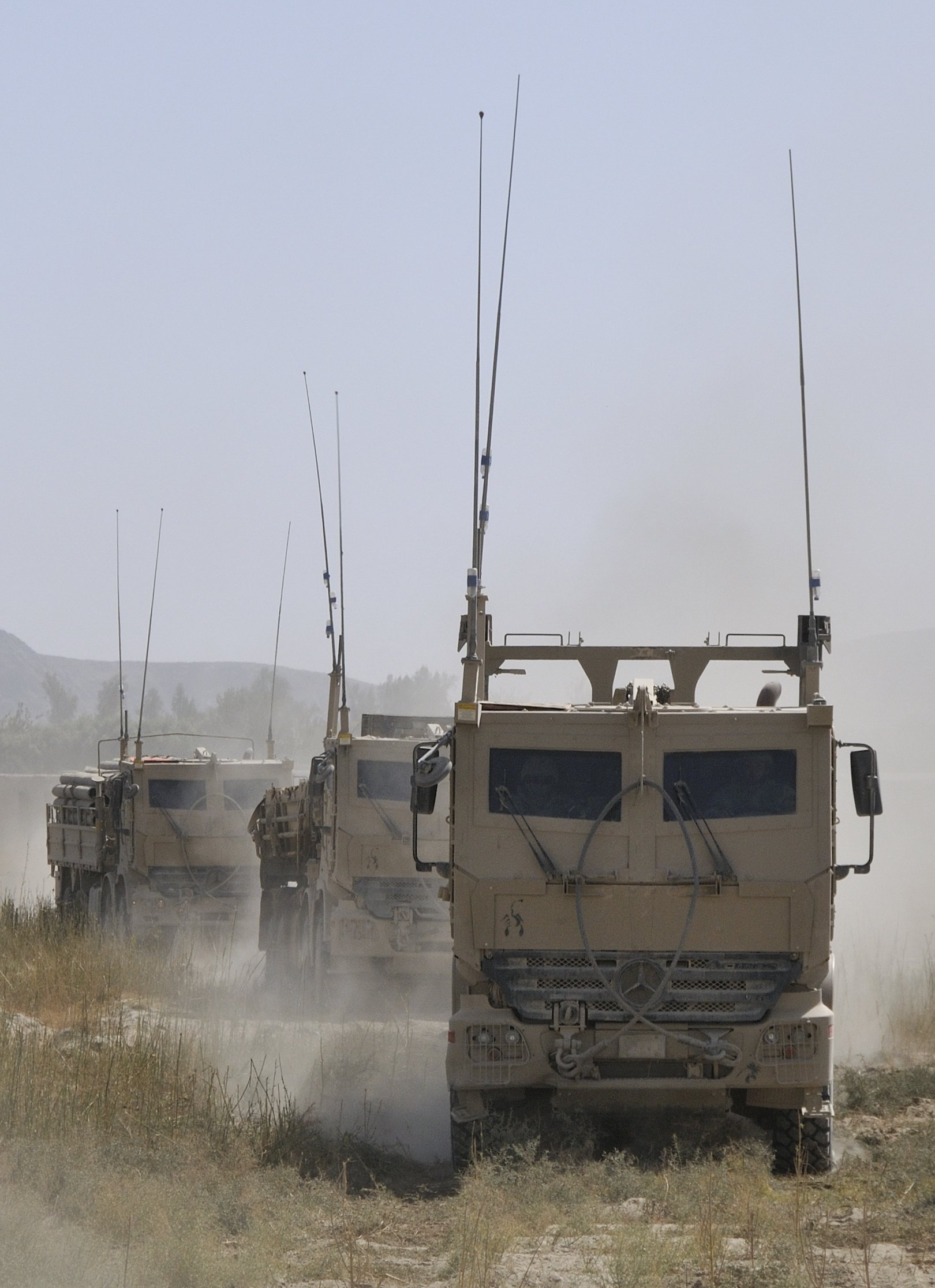A convoy of Armoured Heavy Support Vehicle Systems during operations in the volatile Panjwa’i and Zhari Districts of Kandahar Province. These vehicles move equipment that is critical to the conduct of prolonged operations. Taken on October 17, 2010 Credit: Cpl Shilo Adamson, CAF